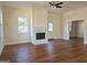 Living room with hardwood floors and fireplace at 321 Seventh Ave, Scottdale, GA 30079