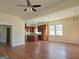 Open living room with kitchen and dining area visible at 321 Seventh Ave, Scottdale, GA 30079