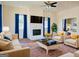 Spacious living room with fireplace and hardwood floors at 321 Seventh Ave, Scottdale, GA 30079