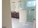 Elegant bathroom with double vanity, large shower, and marble floors at 321 Seventh Ave, Scottdale, GA 30079