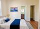 Main bedroom with ensuite bathroom and hardwood floors at 321 Seventh Ave, Scottdale, GA 30079