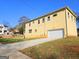 House exterior with driveway and garage at 321 Seventh Ave, Scottdale, GA 30079