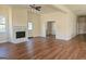 Living room with hardwood floors and fireplace at 321 Seventh Ave, Scottdale, GA 30079