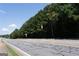 Wooded lot along a roadway at 4556 Wade Green Nw Rd, Acworth, GA 30102