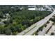 Aerial view of a large wooded lot near a road at 4556 Wade Green Nw Rd, Acworth, GA 30102