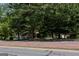 Two houses partially visible behind trees at 4556 Wade Green Nw Rd, Acworth, GA 30102