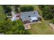 Aerial view showing home, yard, and firepit at 1092 Harbins Rd, Dacula, GA 30019