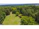 Aerial view of lot with shed and small trees at 1092 Harbins Rd, Dacula, GA 30019