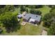 Aerial view of home with large backyard and firepit at 1092 Harbins Rd, Dacula, GA 30019