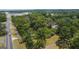 Aerial view showing property's location near a road and other buildings at 1072 Harbins Rd, Dacula, GA 30019