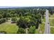 Aerial view of property showing road and surrounding environment at 1072 Harbins Rd, Dacula, GA 30019