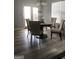 Bright dining room featuring a table with four chairs and access to a deck at 25 Franklin Way, Covington, GA 30016