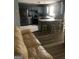 Modern kitchen with stainless steel appliances and an island with seating at 25 Franklin Way, Covington, GA 30016