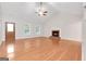 Inviting living room with hardwood floors and fireplace at 1281 Ohara Dr, Mcdonough, GA 30253