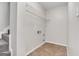 Convenient laundry room with shelving and tile floor at 1281 Ohara Dr, Mcdonough, GA 30253