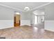 Dining room with tile floors and access to kitchen and living areas at 3752 Arminto Dr, Ellenwood, GA 30294