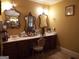 Double vanity bathroom with large mirrors and ample storage at 1145 Lake Stone Lea Dr, Oxford, GA 30054