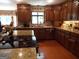Spacious kitchen with granite countertops, ample cabinetry, and hardwood floors at 1145 Lake Stone Lea Dr, Oxford, GA 30054