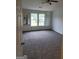 Spacious bedroom with large windows and plush carpeting at 1950 Wynhurst Xing, Stone Mountain, GA 30088
