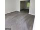 Spacious living room with gray carpeting at 1950 Wynhurst Xing, Stone Mountain, GA 30088