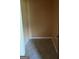 Small room with tan walls and tile flooring at 175 Moss Dr, Mcdonough, GA 30252