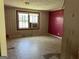 Simple bedroom with pink walls, window, and wall-mounted AC unit at 175 Moss Dr, Mcdonough, GA 30252