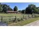 Brick ranch house with red roof, situated on a large lot at 175 Moss Dr, Mcdonough, GA 30252