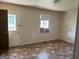 Foyer with tile flooring, window, and exterior door at 175 Moss Dr, Mcdonough, GA 30252