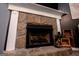 Stone fireplace with white mantel in a living room at 4194 Argonne Dr, Villa Rica, GA 30180