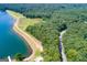 Aerial view of a lakefront lot with road access at 4194 Argonne Dr, Villa Rica, GA 30180