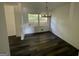 Bright dining room with hardwood floors and a chandelier at 2101 Ann Se Ct, Conyers, GA 30013