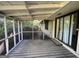 Screened porch with access to backyard and AC unit at 2101 Ann Se Ct, Conyers, GA 30013