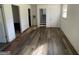 Unfinished basement with staircase and wood-look floors at 2101 Ann Se Ct, Conyers, GA 30013