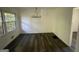 Bright dining room with hardwood floors and a chandelier at 2101 Ann Se Ct, Conyers, GA 30013