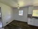 Renovated kitchen with white cabinets, granite counters, and stainless steel appliances at 2101 Ann Se Ct, Conyers, GA 30013