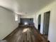 Unfinished basement with wood-look floors and built-in fireplace at 2101 Ann Se Ct, Conyers, GA 30013