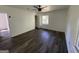 Bedroom with wood-look floors and access to backyard at 2101 Ann Se Ct, Conyers, GA 30013