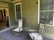 Inviting porch with rocking chairs at 545 Grand Teton Cir, Fayetteville, GA 30215