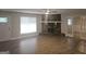 Living Room with corner stone fireplace and hardwood floors at 95 Chimney Smoke Dr, Stockbridge, GA 30281