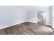 Living room with hardwood floors and view of staircase at 330 N Fayette Dr, Fayetteville, GA 30214