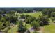 Aerial view of property, highlighting its rural setting and ample land at 1112 Harbins Rd, Dacula, GA 30019