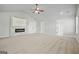 Spacious main bedroom with tray ceiling, fireplace, and carpet at 125 Leverett Ct, Fayetteville, GA 30215