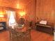 Charming dining room with wood walls and piano at 7505 Hall Rd, Fairburn, GA 30213