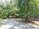 Two sheds in the backyard surrounded by trees at 7505 Hall Rd, Fairburn, GA 30213