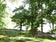 Expansive lake view with lush greenery at 573 Lester Rd, Fayetteville, GA 30215