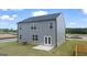 Two-story gray house with patio and backyard at 619 Whitman Ln # 2200, Stockbridge, GA 30281