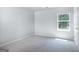 Spacious bedroom featuring a window and neutral wall tones at 619 Whitman Ln # 2200, Stockbridge, GA 30281
