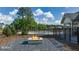 Community fire pit area adjacent to the pool and clubhouse at 619 Whitman Ln # 2200, Stockbridge, GA 30281