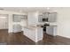 Modern kitchen with gray cabinets, granite countertops, and an island at 619 Whitman Ln # 2200, Stockbridge, GA 30281