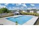Community swimming pool with a large deck area at 619 Whitman Ln # 2200, Stockbridge, GA 30281